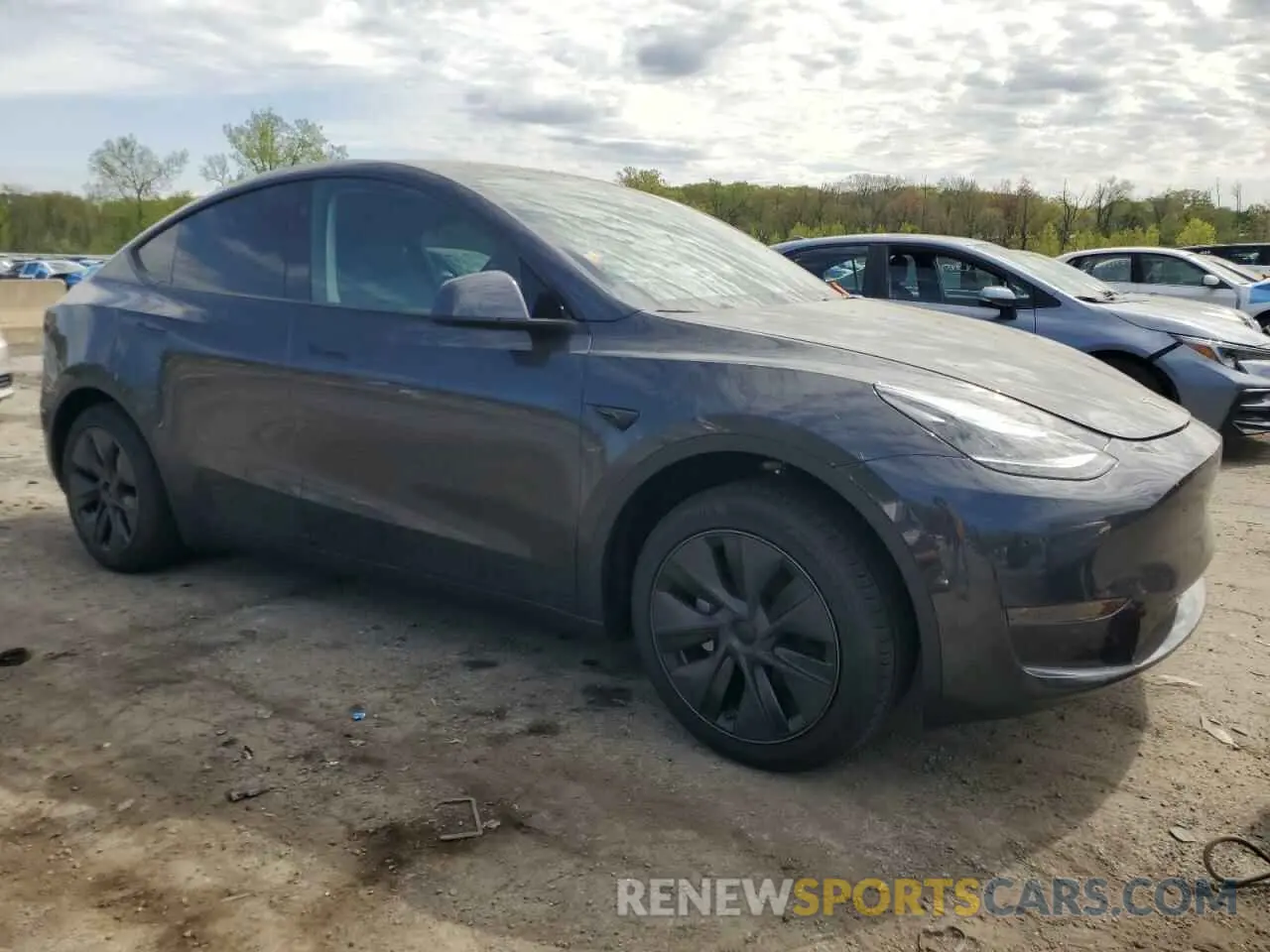 4 Photograph of a damaged car 7SAYGDED7SF320702 TESLA MODEL Y 2025