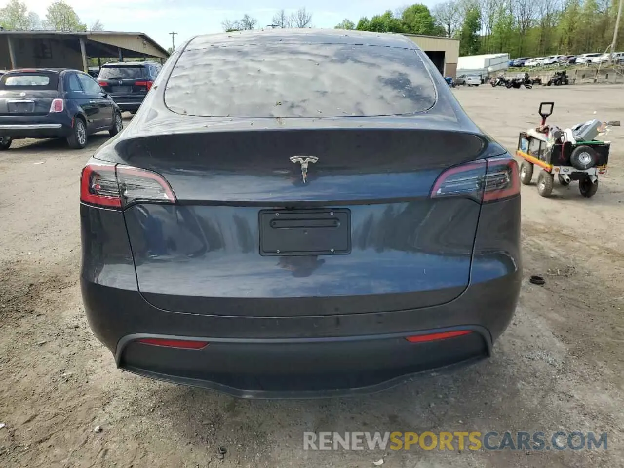 6 Photograph of a damaged car 7SAYGDED7SF320702 TESLA MODEL Y 2025