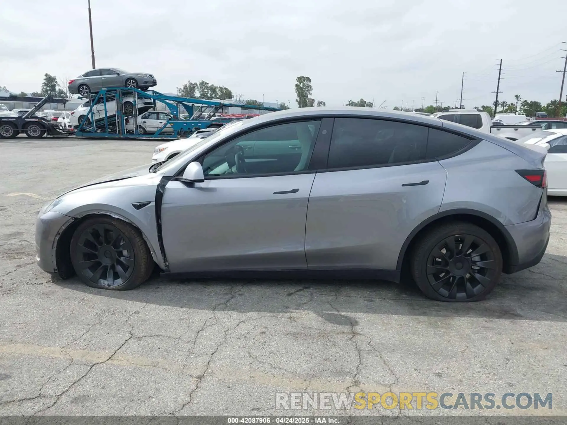 14 Photograph of a damaged car 7SAYGDEE7SF247212 TESLA MODEL Y 2025