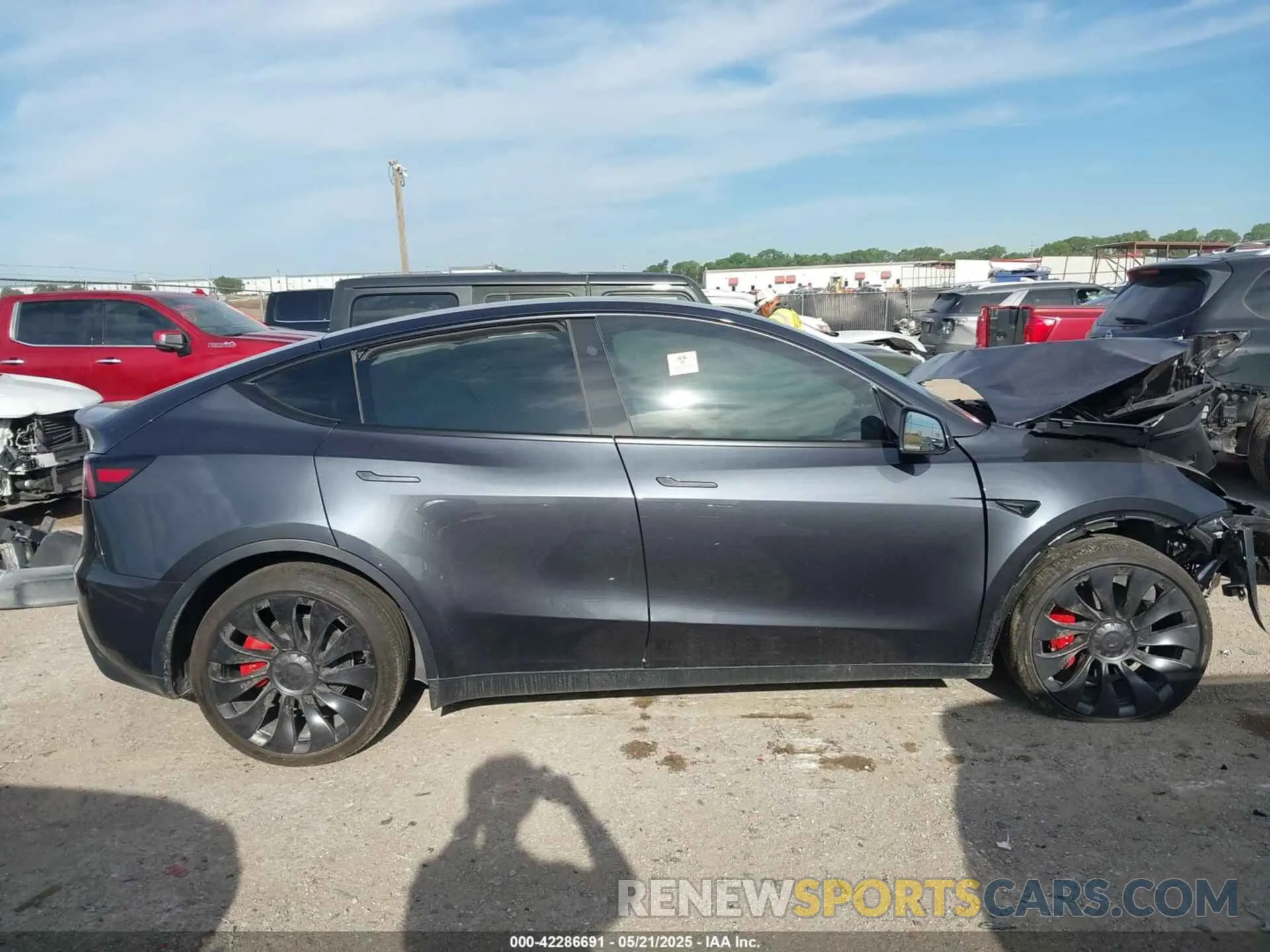 12 Photograph of a damaged car 7SAYGDEF2SA366176 TESLA MODEL Y 2025