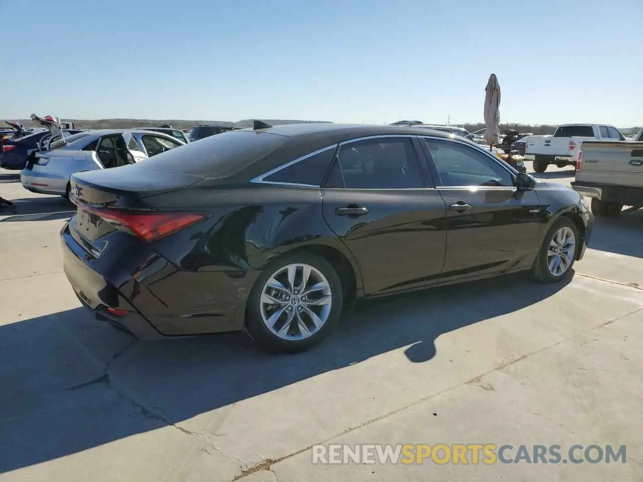 3 Photograph of a damaged car 4T1JA1AB8MU001429 TOYOTA AVALON 2021