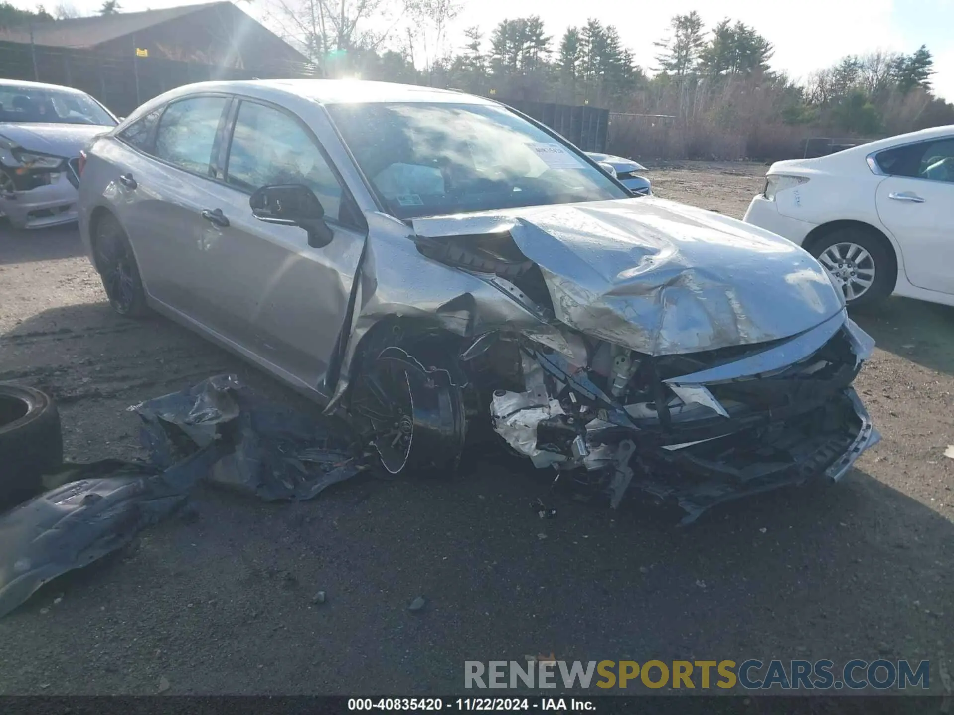 1 Photograph of a damaged car 4T1EA1AB3NU015824 TOYOTA AVALON 2022