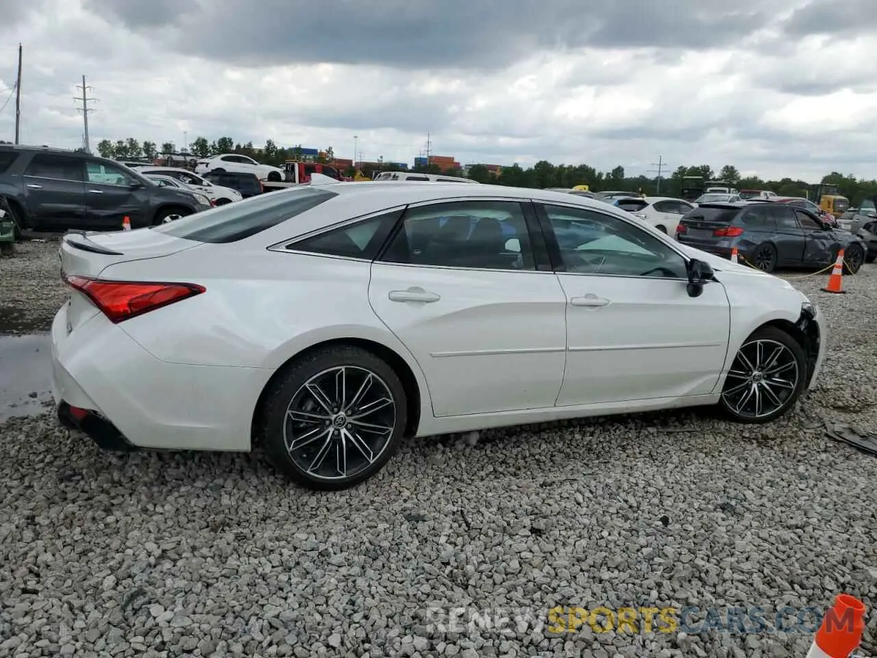 3 Photograph of a damaged car 4T1HZ1FB3NU084687 TOYOTA AVALON 2022