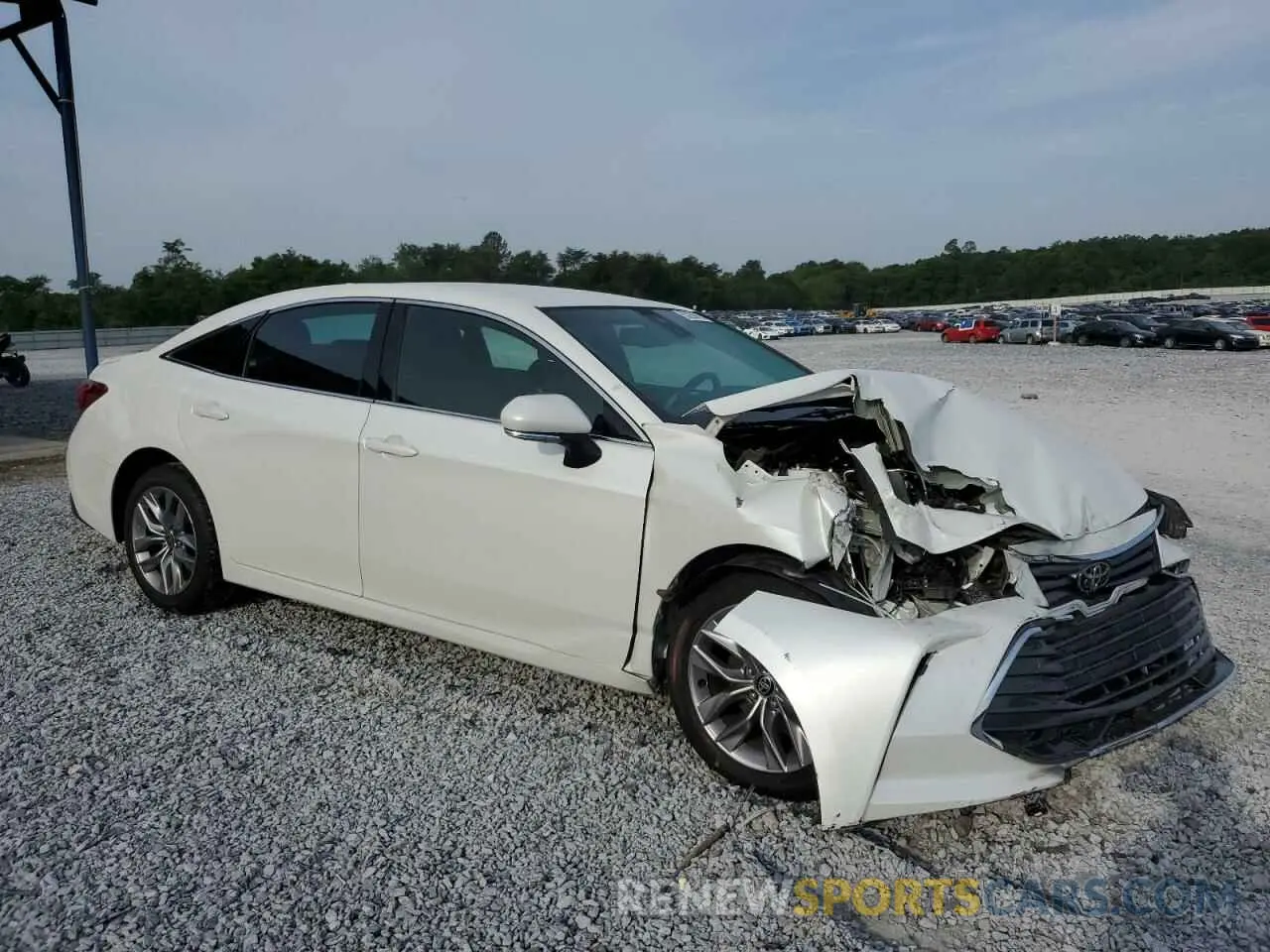 4 Photograph of a damaged car 4T1JZ1FB0NU071218 TOYOTA AVALON 2022