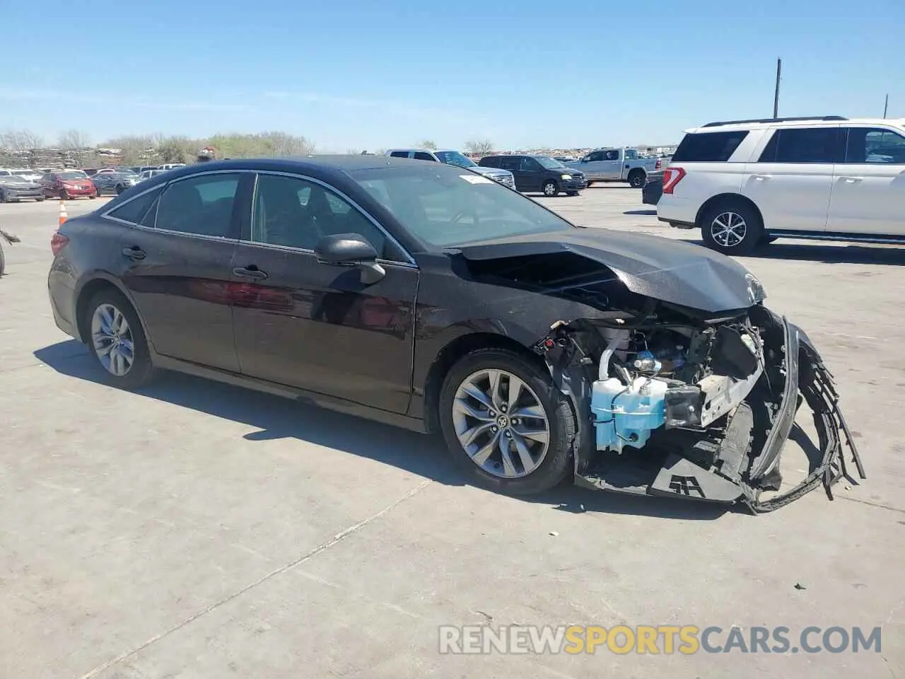 4 Photograph of a damaged car 4T1JZ1FB9NU083982 TOYOTA AVALON 2022