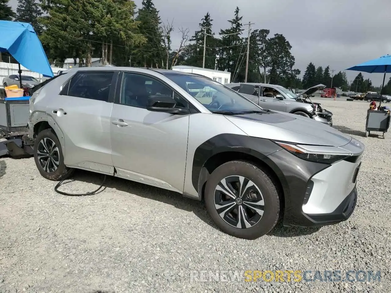4 Photograph of a damaged car JTMABACAXPA015022 TOYOTA BZ4X XLE 2023
