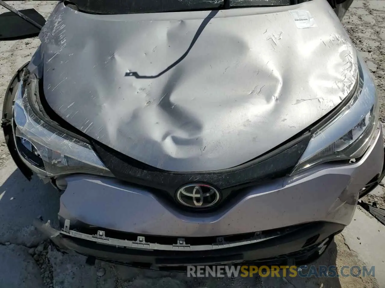 12 Photograph of a damaged car JTNKHMBX5L1080523 TOYOTA C-HR 2020