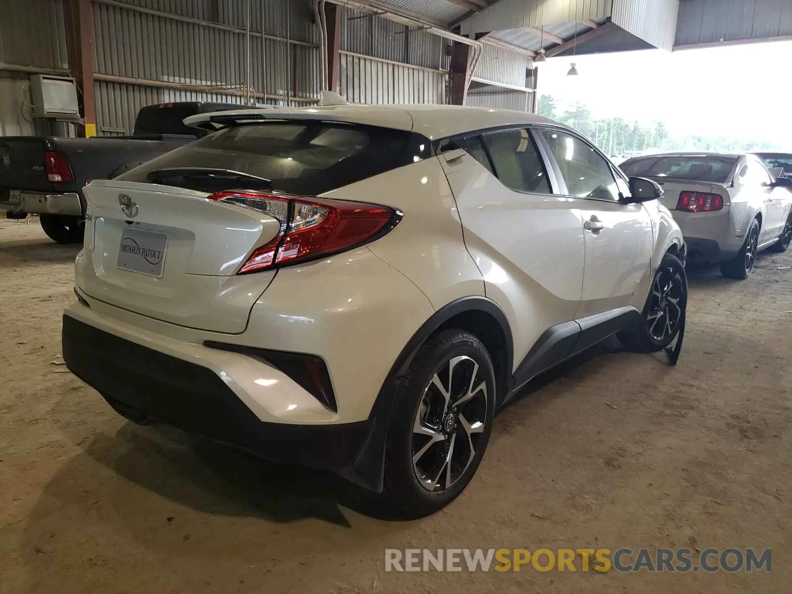 4 Photograph of a damaged car JTNKHMBX1M1115592 TOYOTA C-HR 2021