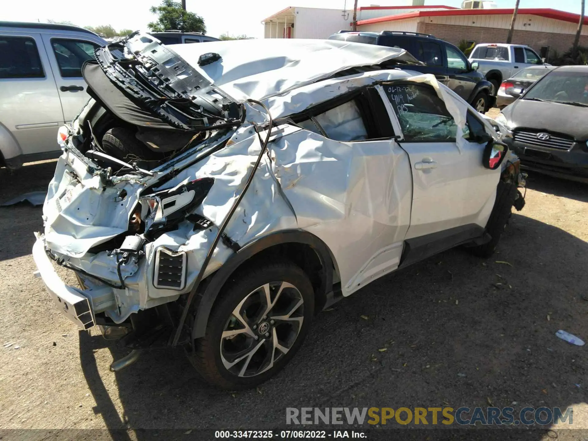 4 Photograph of a damaged car NMTKHMBX0NR144119 TOYOTA C-HR 2022