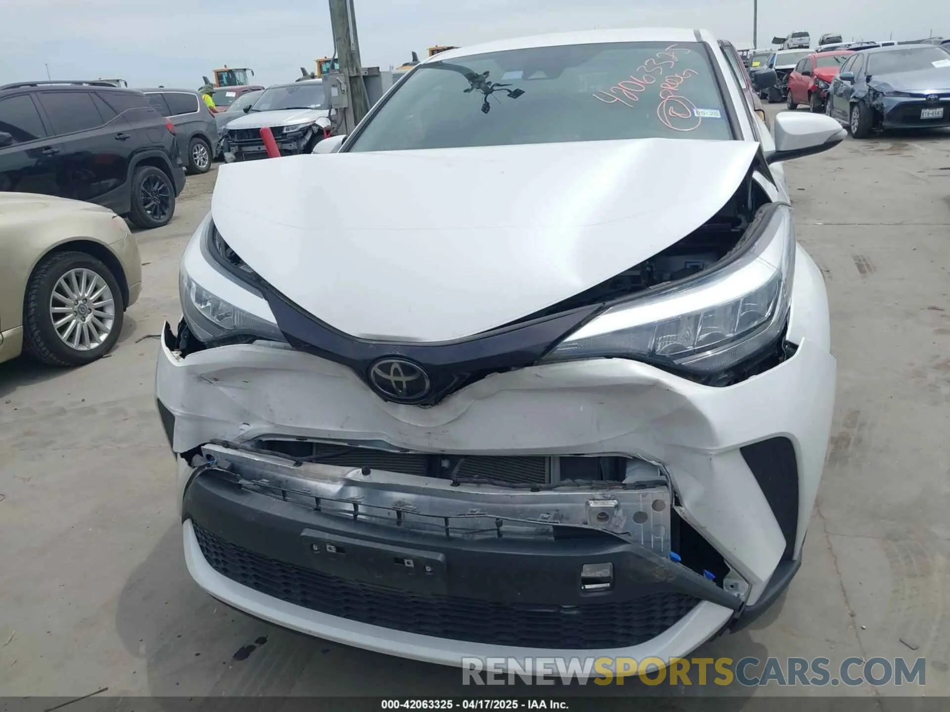 12 Photograph of a damaged car NMTKHMBX2NR144638 TOYOTA C-HR 2022