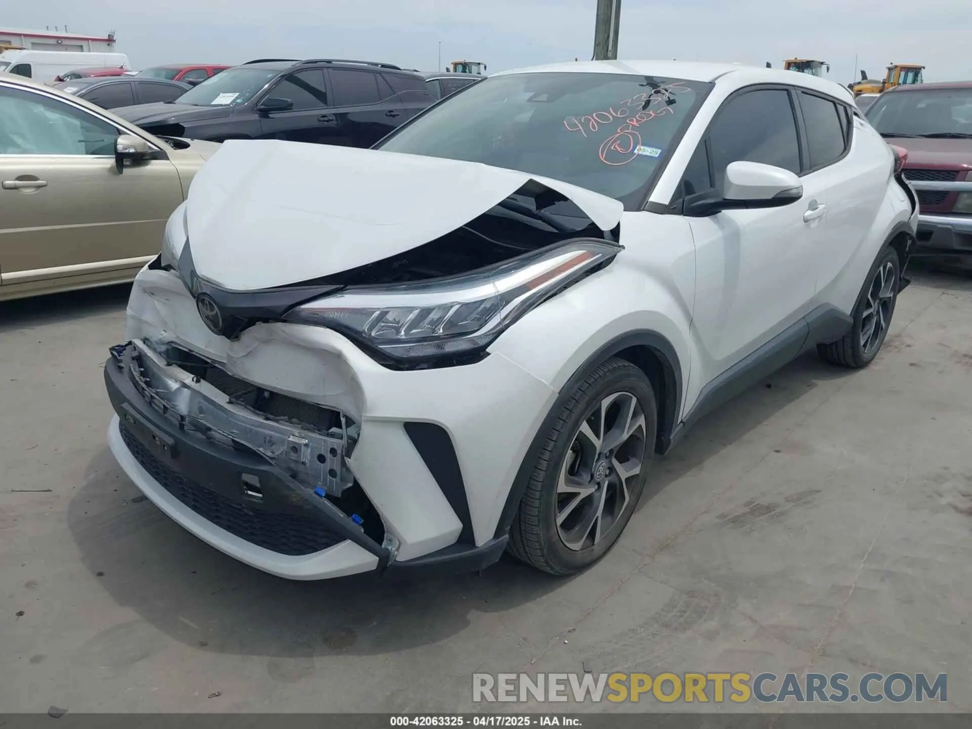 2 Photograph of a damaged car NMTKHMBX2NR144638 TOYOTA C-HR 2022