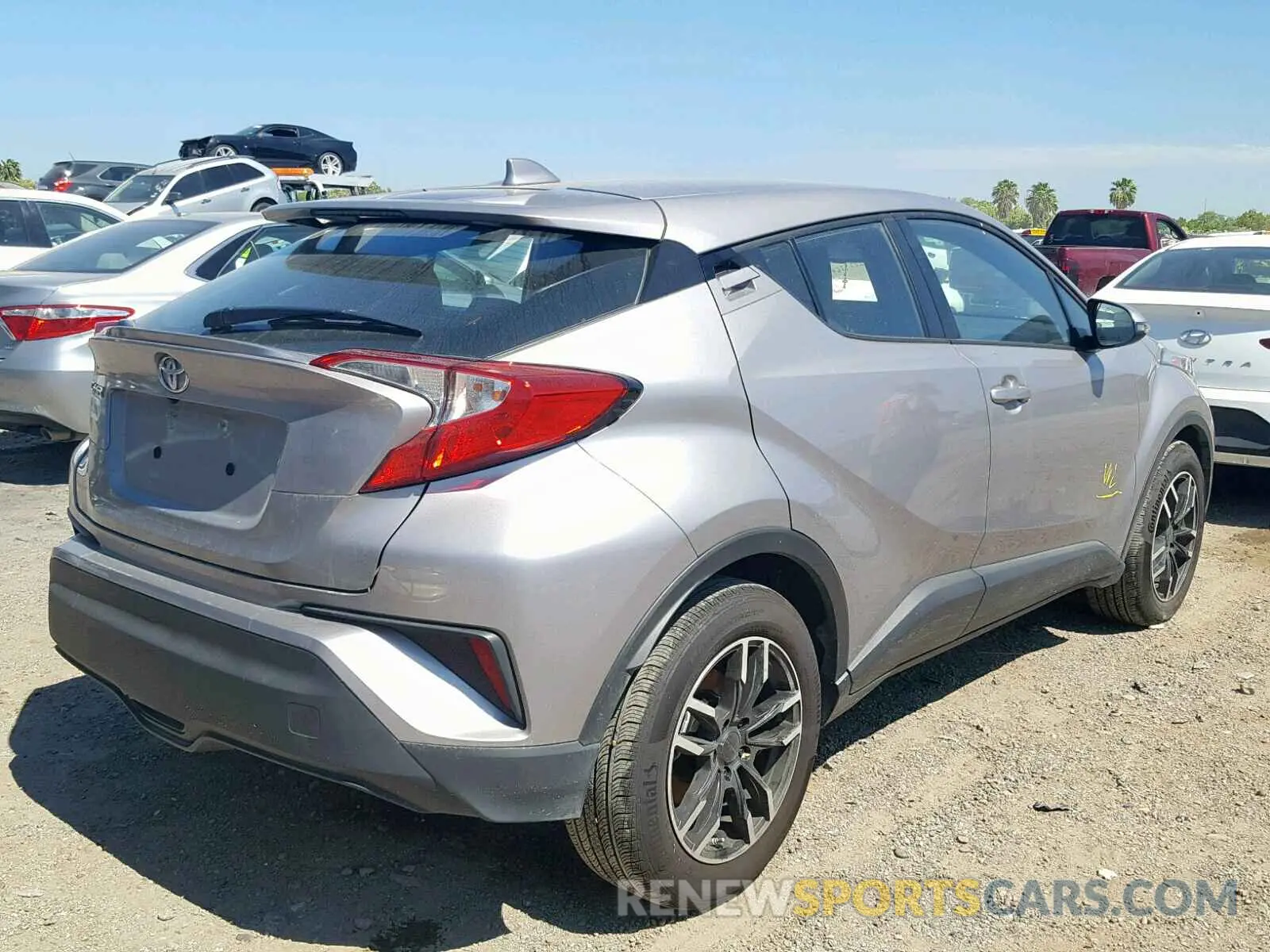 4 Photograph of a damaged car NMTKHMBX3KR080136 TOYOTA C-HR XLE 2019
