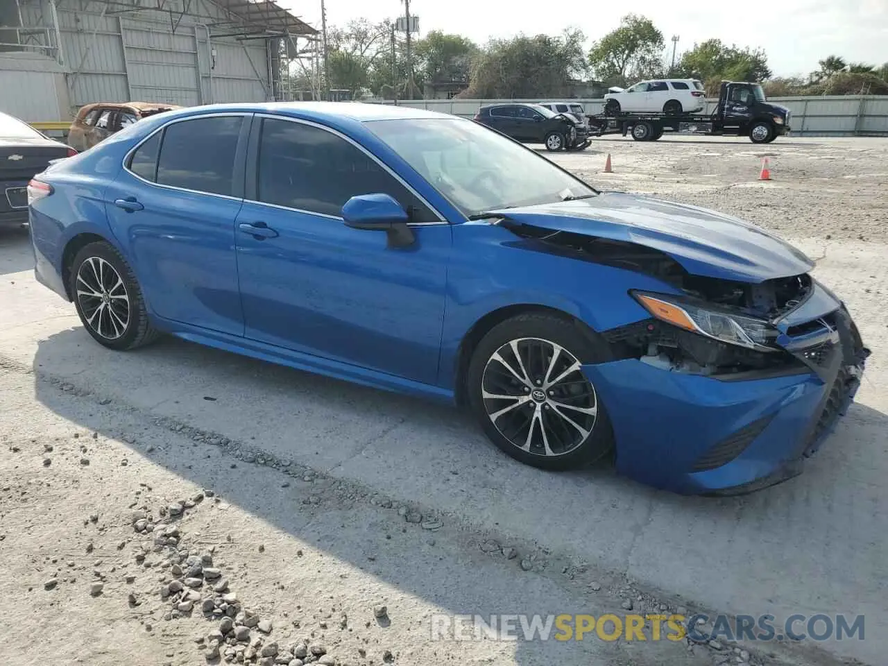 4 Photograph of a damaged car 4T1B11HK0KU175695 TOYOTA CAMRY 2019