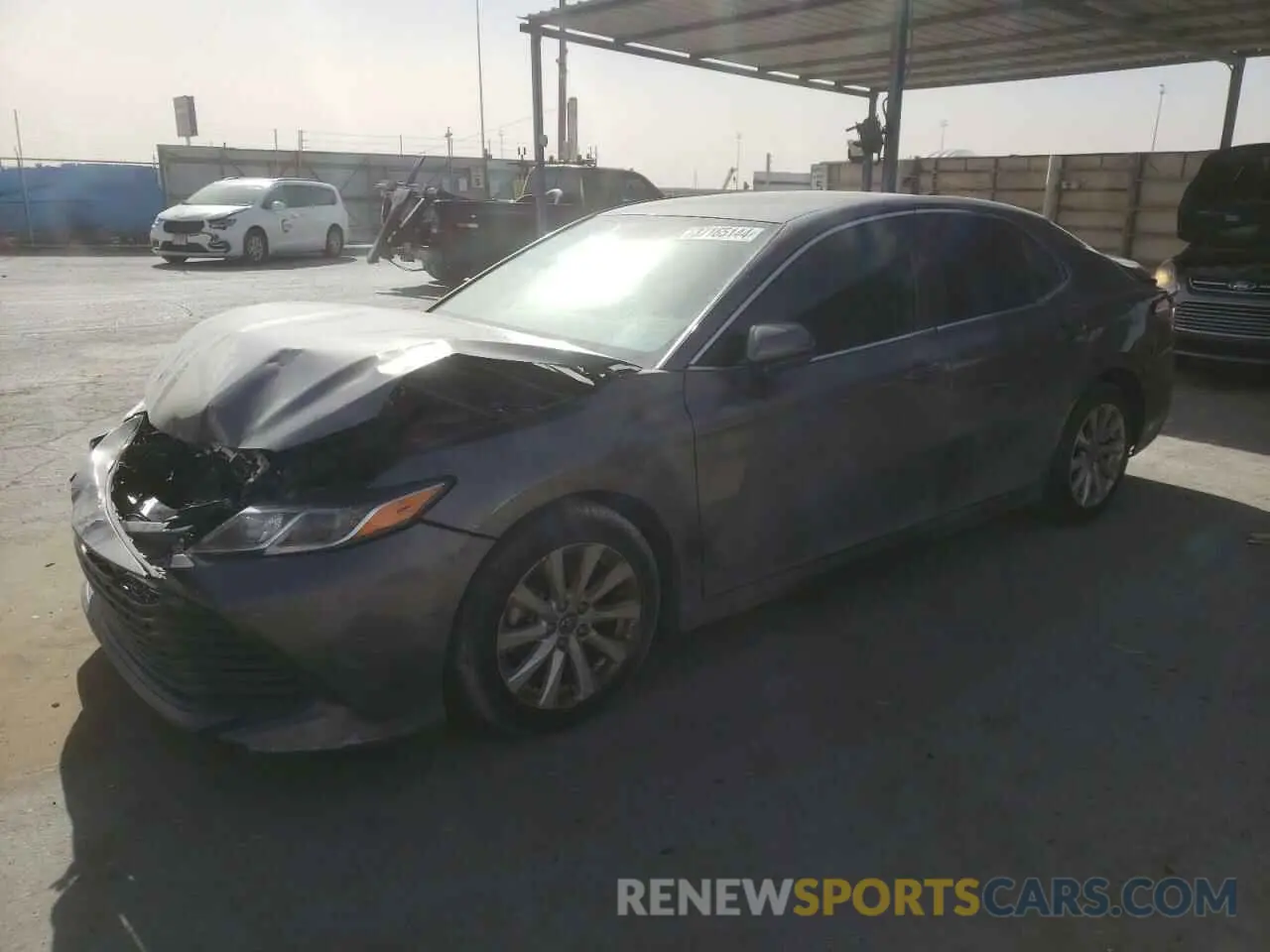1 Photograph of a damaged car 4T1B11HK0KU216892 TOYOTA CAMRY 2019
