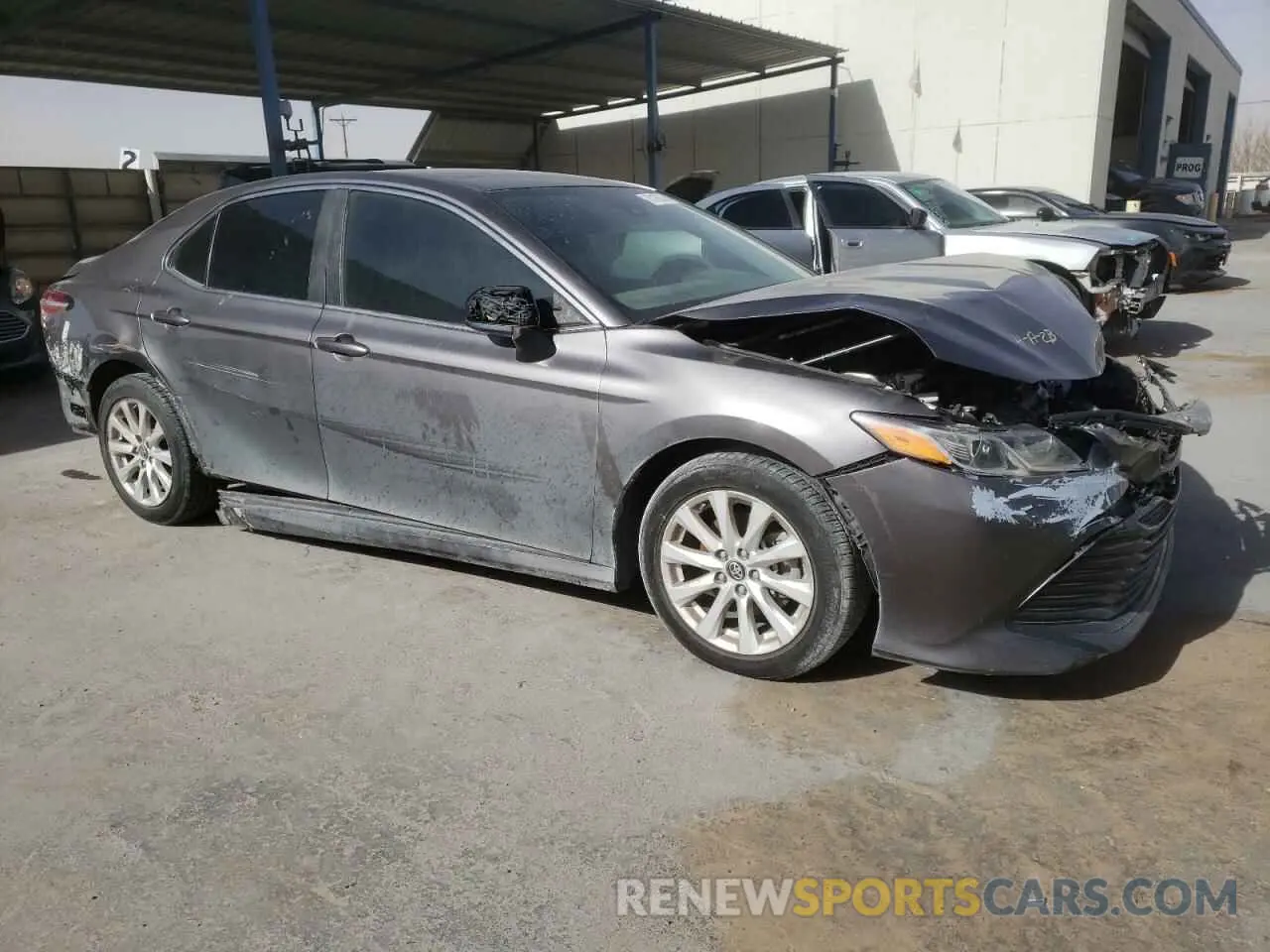 4 Photograph of a damaged car 4T1B11HK0KU216892 TOYOTA CAMRY 2019