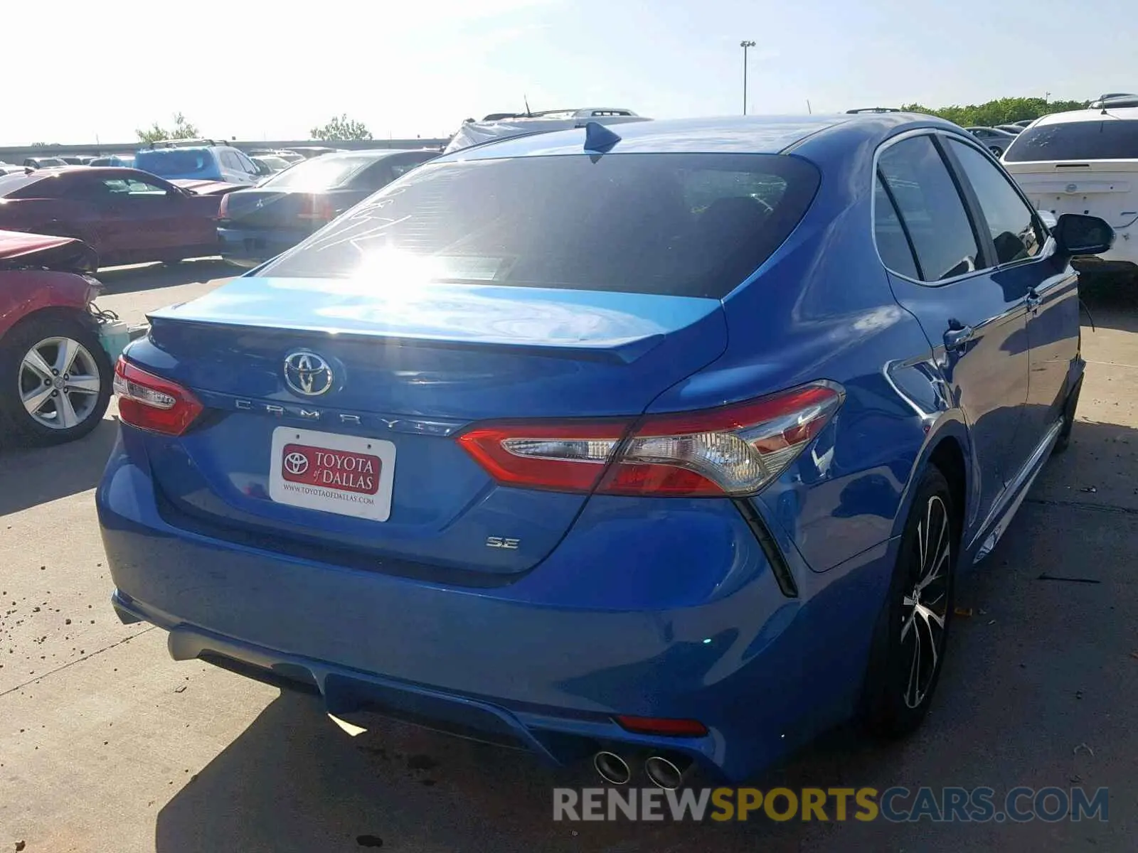 4 Photograph of a damaged car 4T1B11HK0KU242621 TOYOTA CAMRY 2019