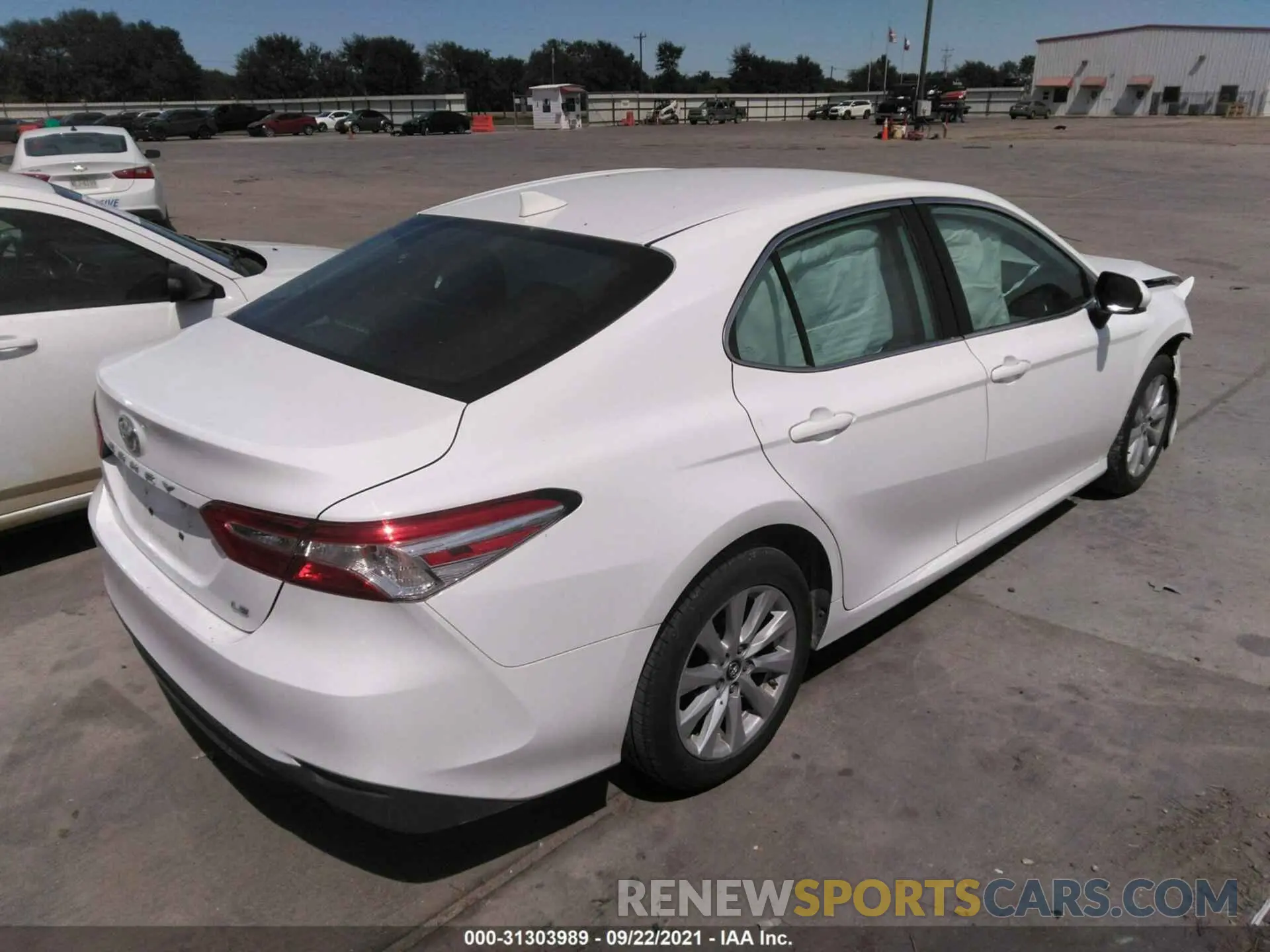4 Photograph of a damaged car 4T1B11HK0KU679244 TOYOTA CAMRY 2019