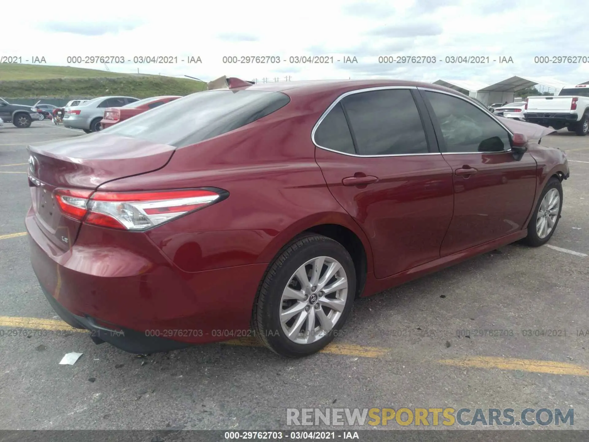 4 Photograph of a damaged car 4T1B11HK0KU692141 TOYOTA CAMRY 2019
