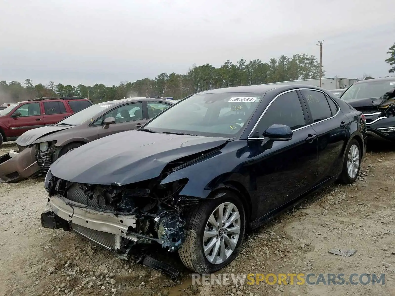 2 Photograph of a damaged car 4T1B11HK0KU699333 TOYOTA CAMRY 2019
