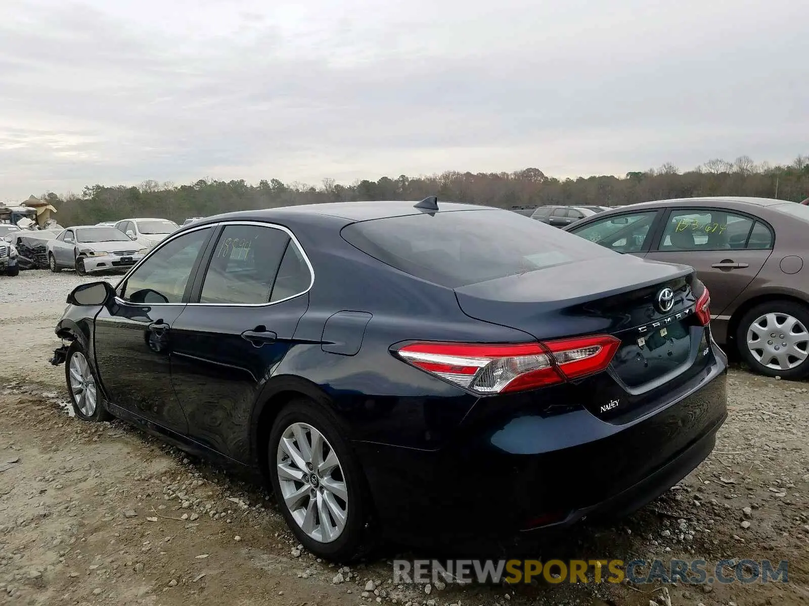 3 Photograph of a damaged car 4T1B11HK0KU699333 TOYOTA CAMRY 2019