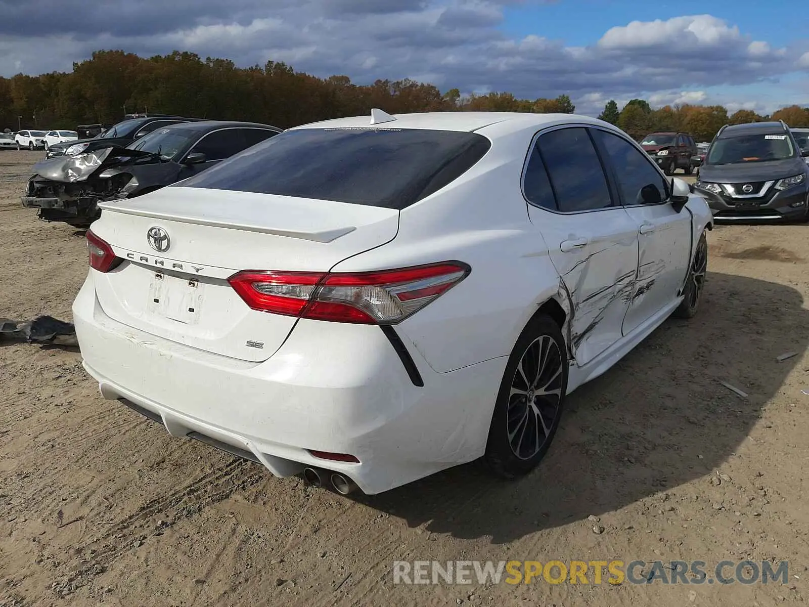 4 Photograph of a damaged car 4T1B11HK0KU700299 TOYOTA CAMRY 2019