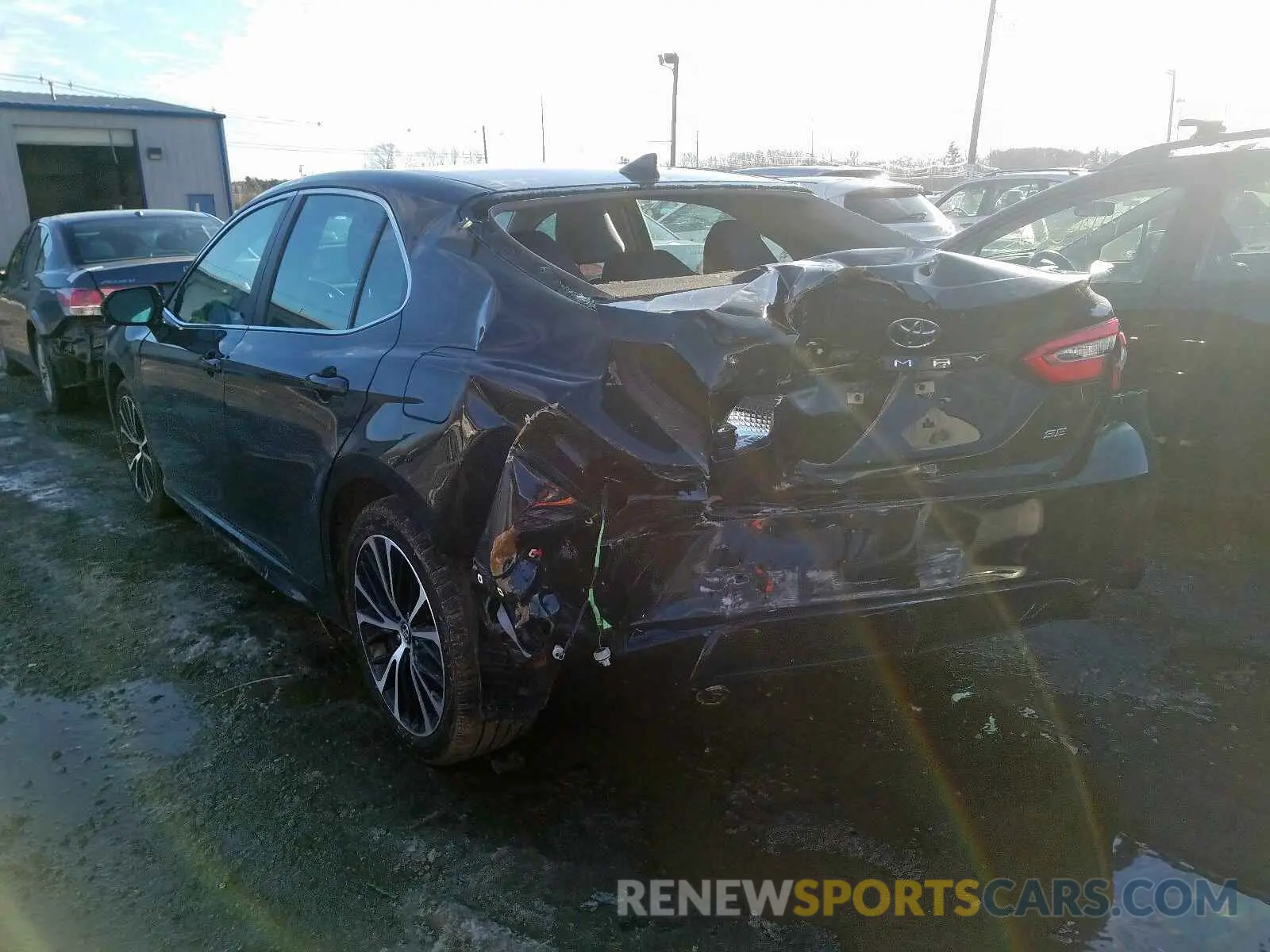 3 Photograph of a damaged car 4T1B11HK0KU723131 TOYOTA CAMRY 2019