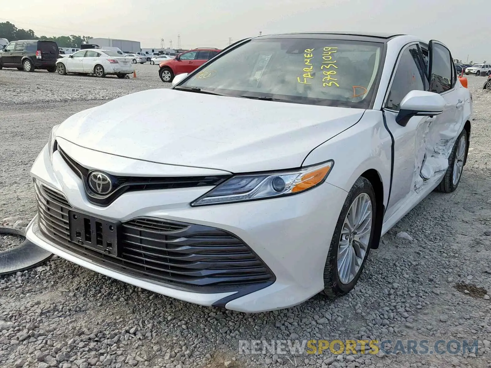 2 Photograph of a damaged car 4T1B11HK0KU733920 TOYOTA CAMRY 2019
