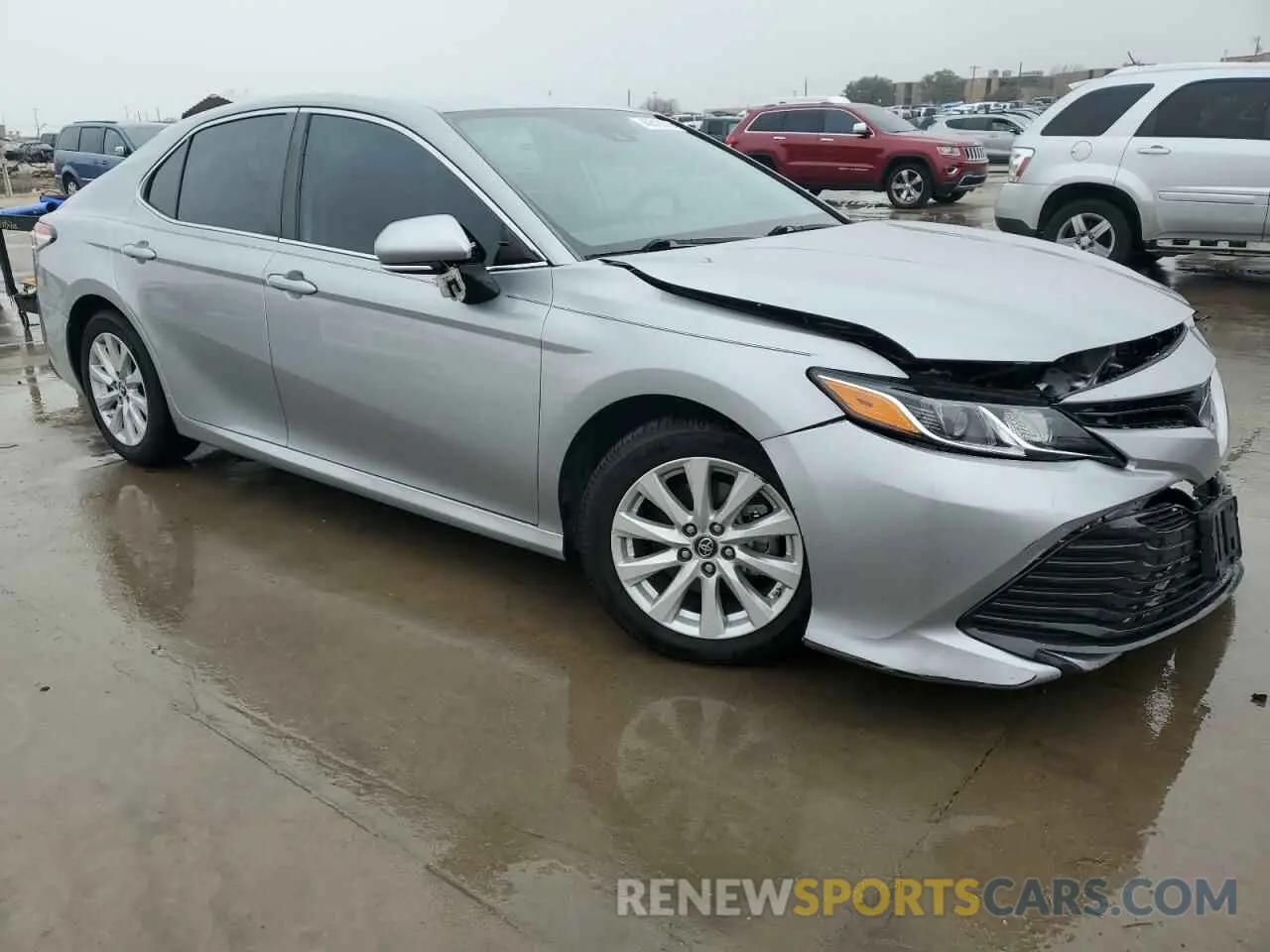 4 Photograph of a damaged car 4T1B11HK0KU752466 TOYOTA CAMRY 2019