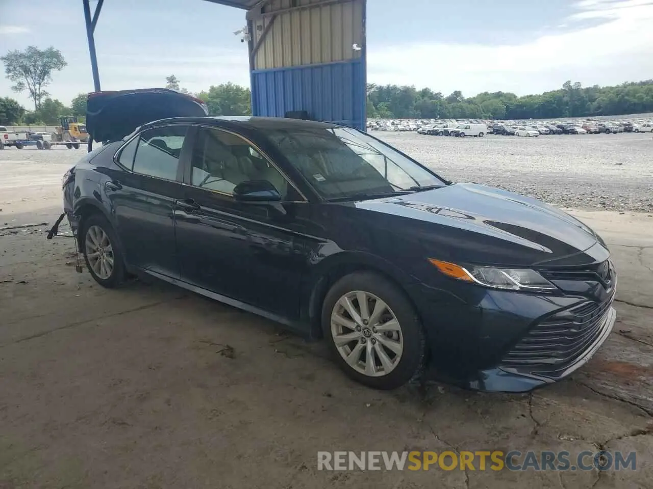 4 Photograph of a damaged car 4T1B11HK0KU766142 TOYOTA CAMRY 2019