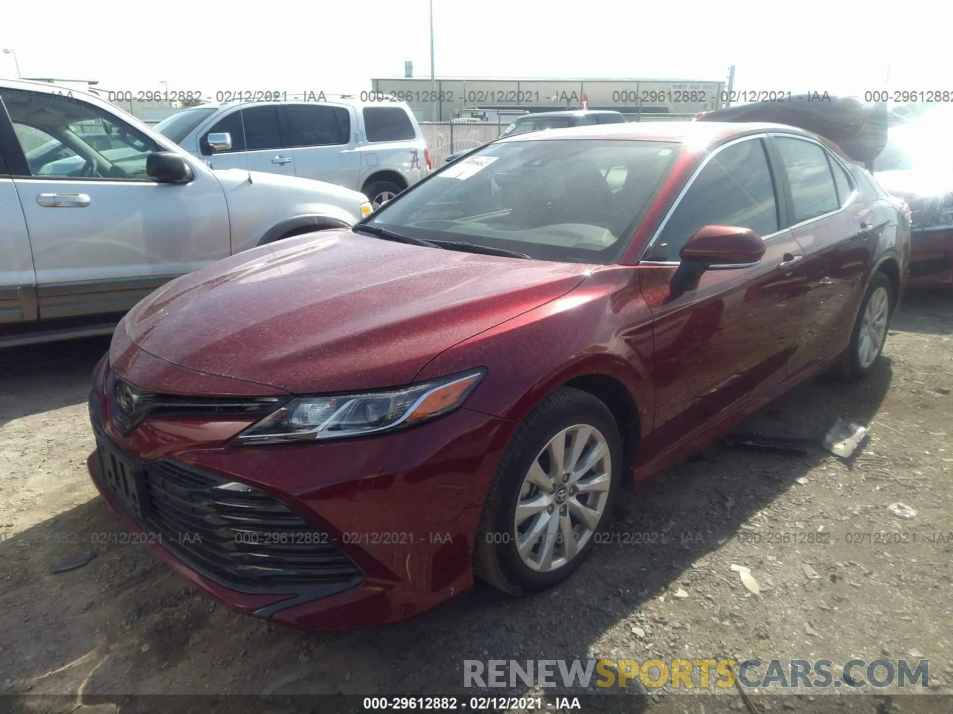 2 Photograph of a damaged car 4T1B11HK0KU817221 TOYOTA CAMRY 2019