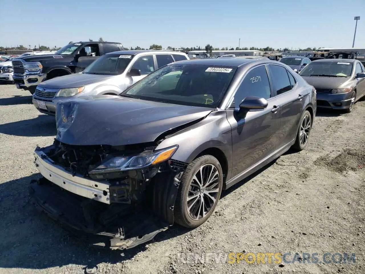 2 Photograph of a damaged car 4T1B11HK0KU834357 TOYOTA CAMRY 2019