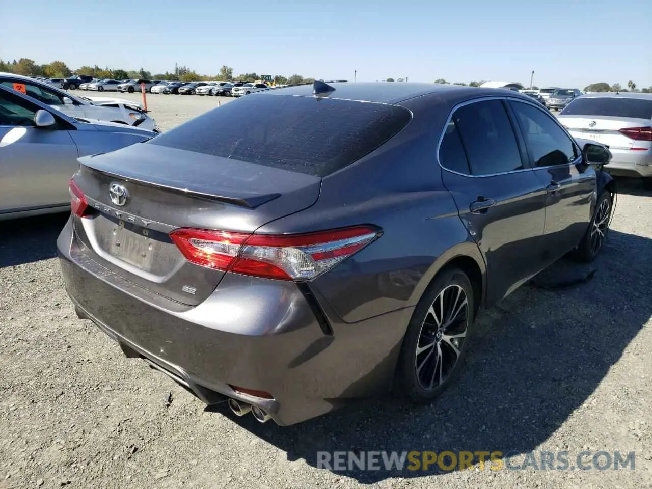 4 Photograph of a damaged car 4T1B11HK0KU834357 TOYOTA CAMRY 2019