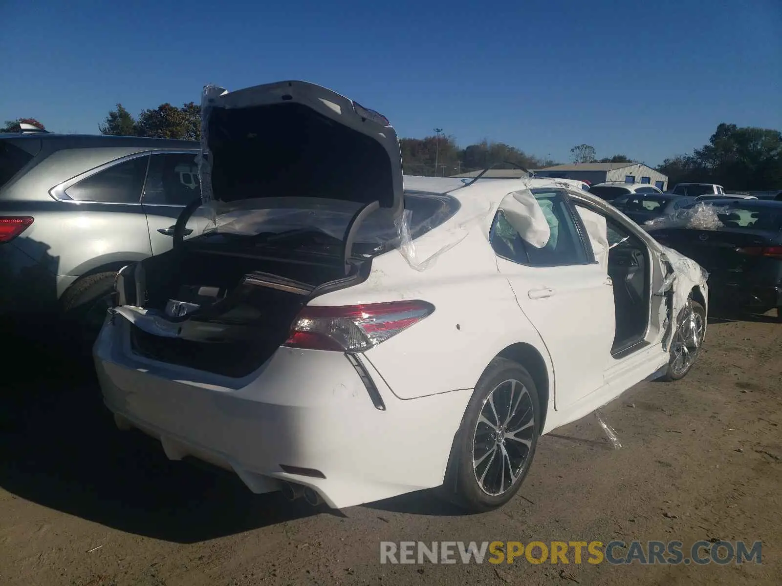 4 Photograph of a damaged car 4T1B11HK0KU850963 TOYOTA CAMRY 2019