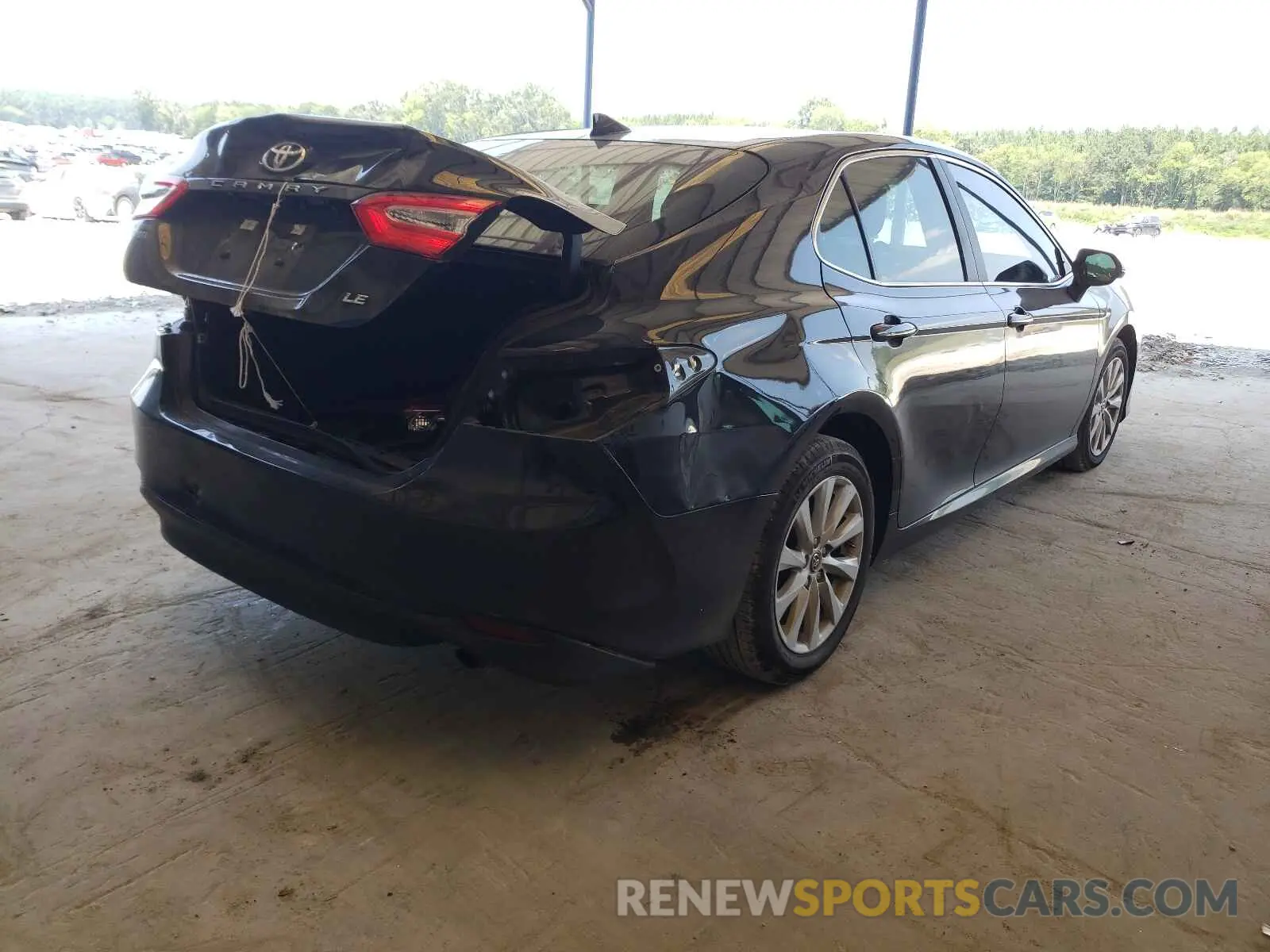 4 Photograph of a damaged car 4T1B11HK0KU852759 TOYOTA CAMRY 2019