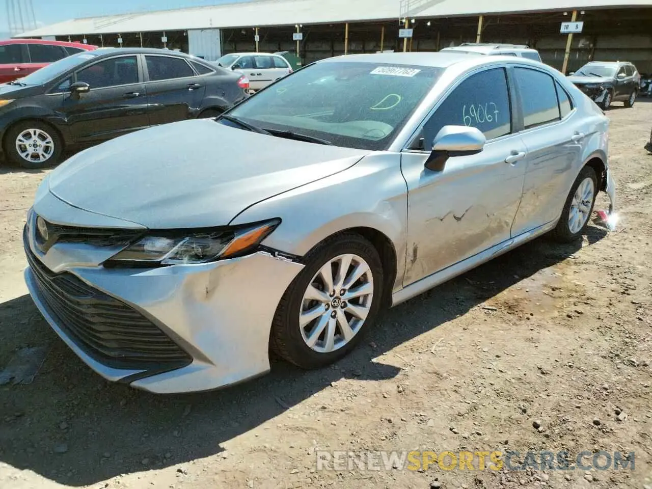 2 Photograph of a damaged car 4T1B11HK1KU173521 TOYOTA CAMRY 2019
