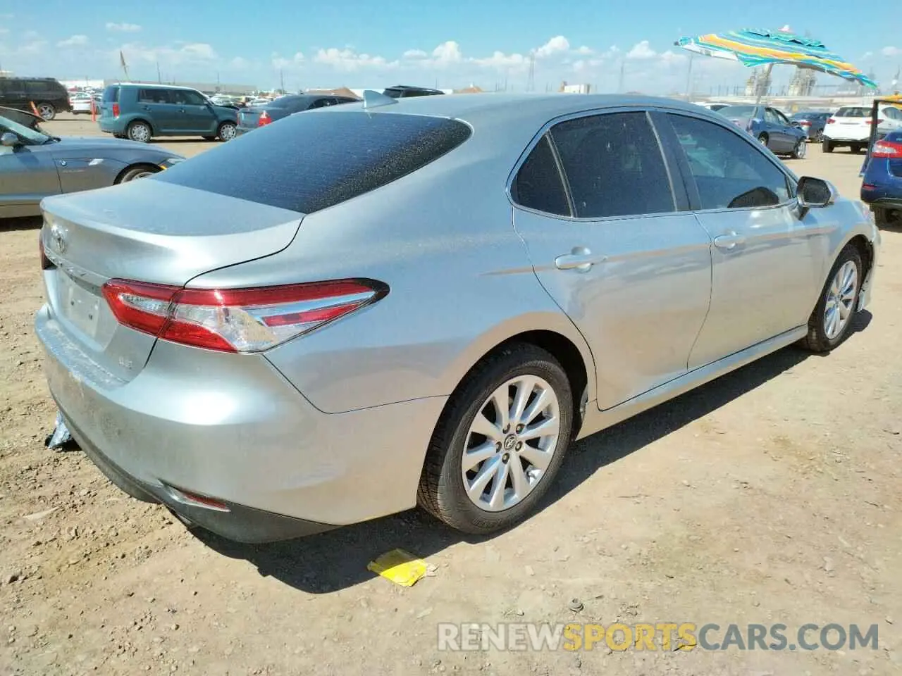 4 Photograph of a damaged car 4T1B11HK1KU173521 TOYOTA CAMRY 2019