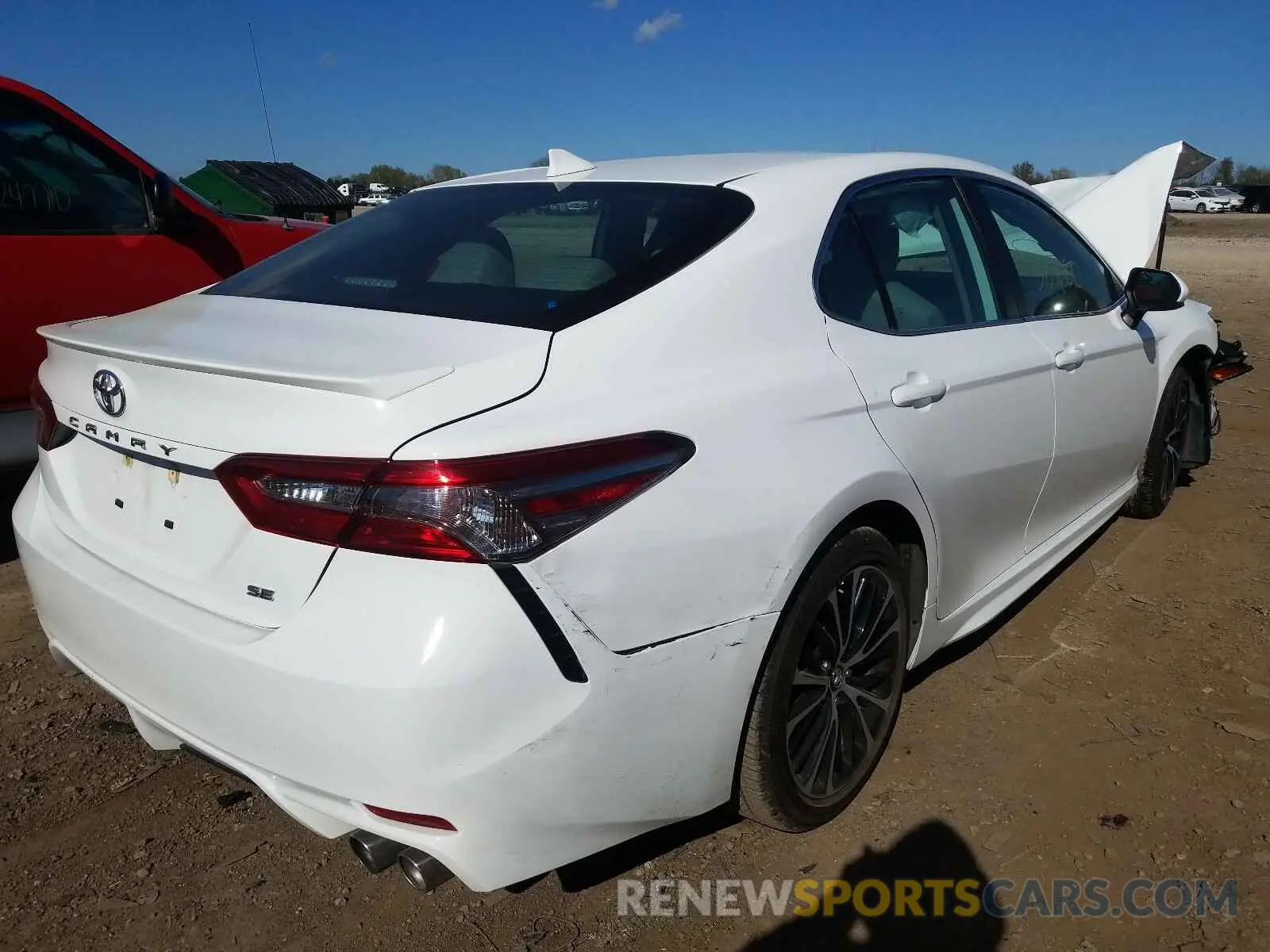 4 Photograph of a damaged car 4T1B11HK1KU173583 TOYOTA CAMRY 2019