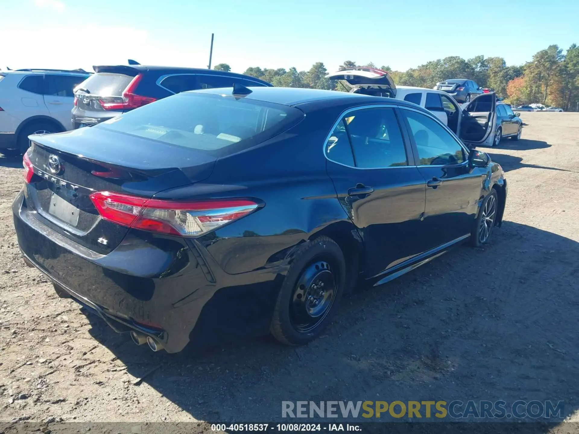 4 Photograph of a damaged car 4T1B11HK1KU176404 TOYOTA CAMRY 2019