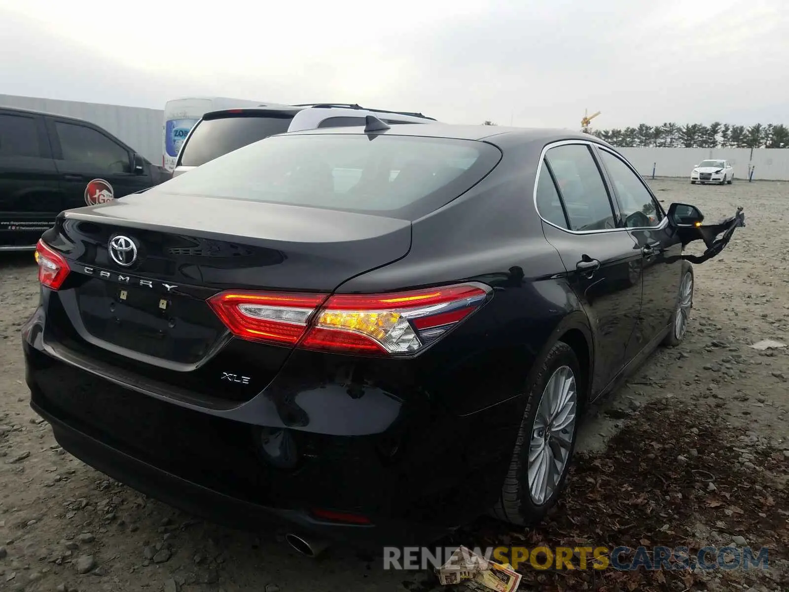 4 Photograph of a damaged car 4T1B11HK1KU193316 TOYOTA CAMRY 2019