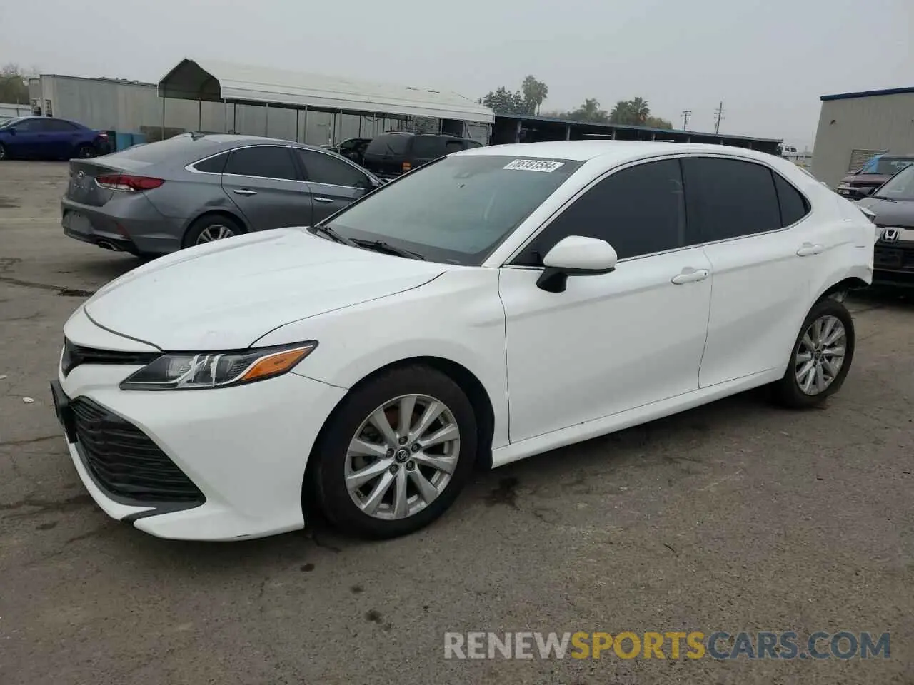 1 Photograph of a damaged car 4T1B11HK1KU205318 TOYOTA CAMRY 2019