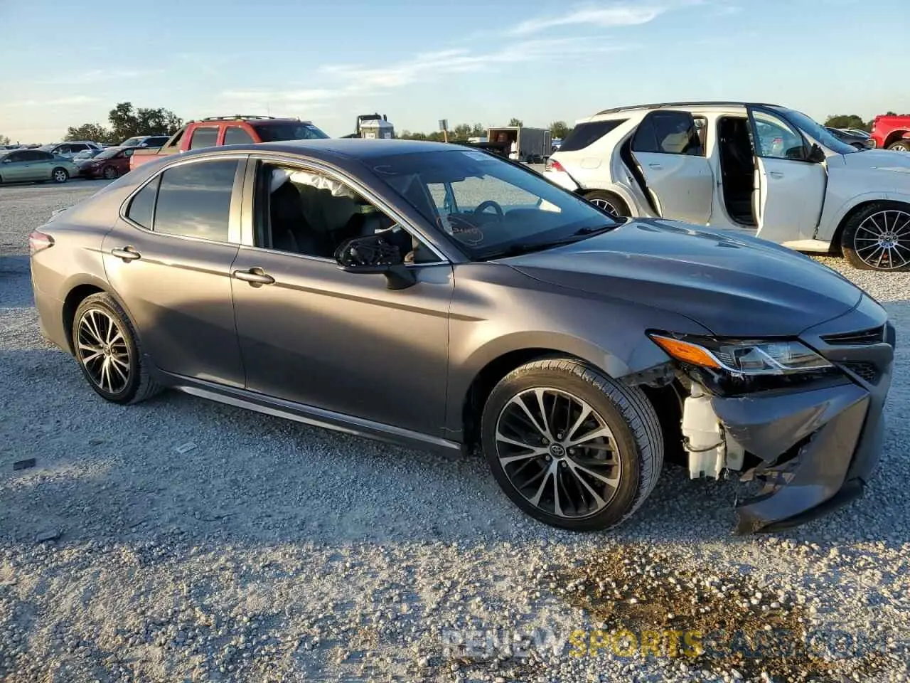 4 Photograph of a damaged car 4T1B11HK1KU207733 TOYOTA CAMRY 2019