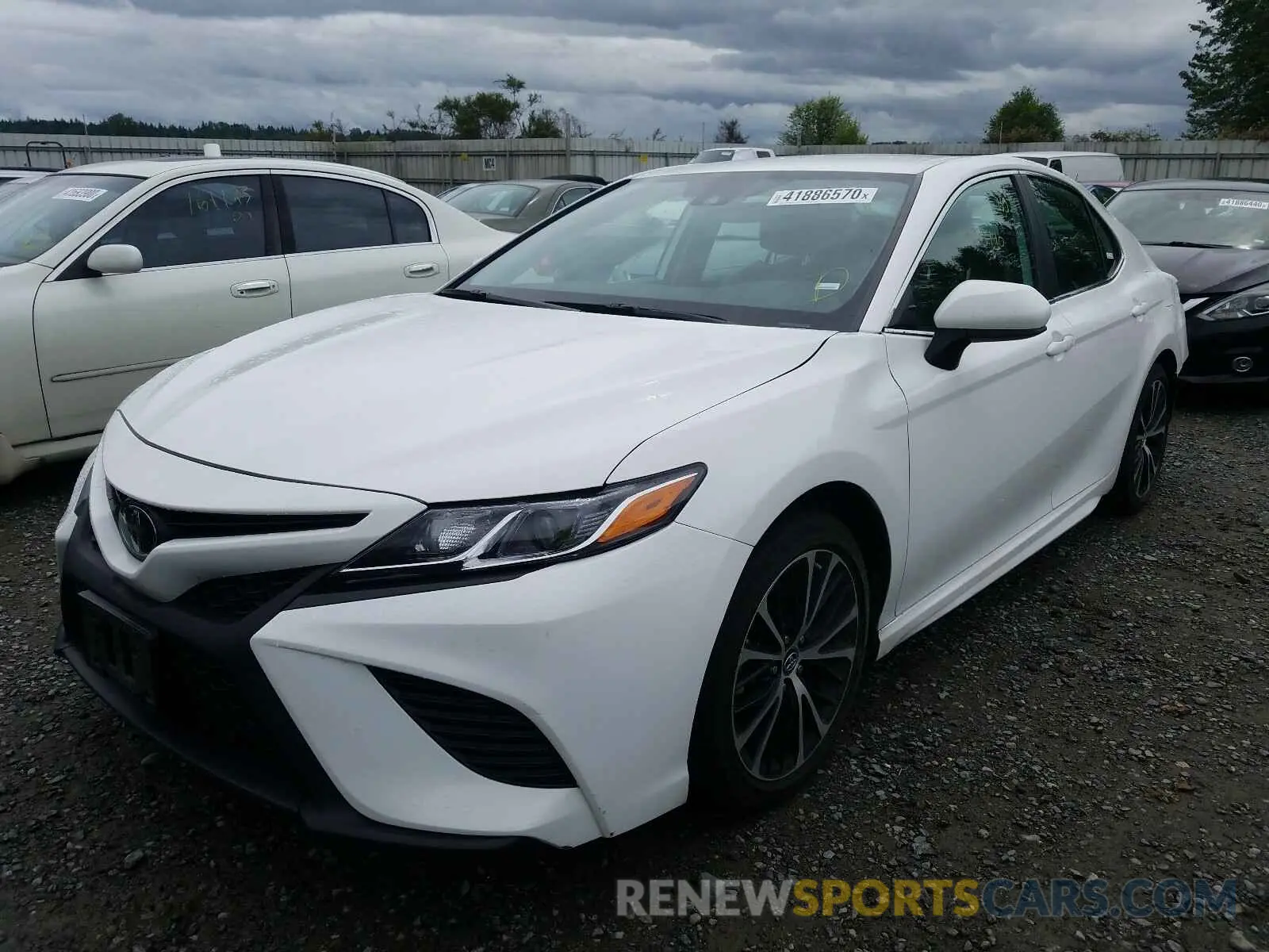 2 Photograph of a damaged car 4T1B11HK1KU212964 TOYOTA CAMRY 2019