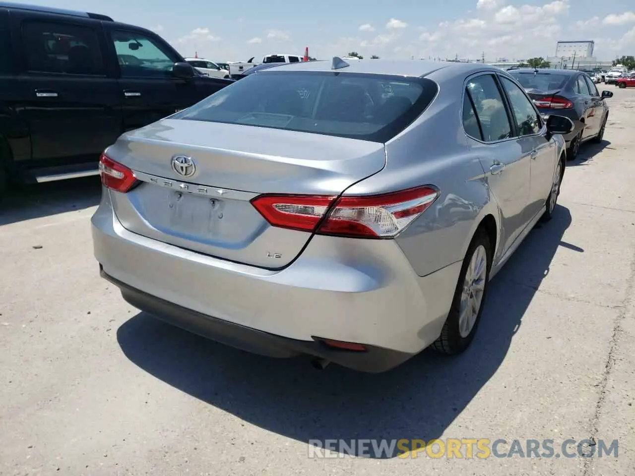 4 Photograph of a damaged car 4T1B11HK1KU213581 TOYOTA CAMRY 2019