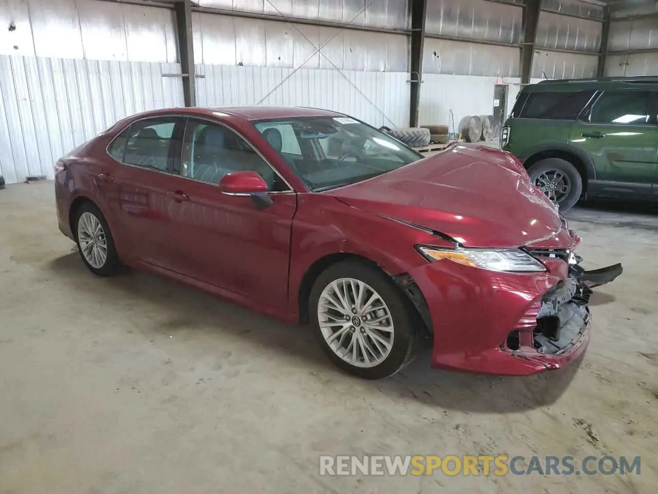 4 Photograph of a damaged car 4T1B11HK1KU234706 TOYOTA CAMRY 2019