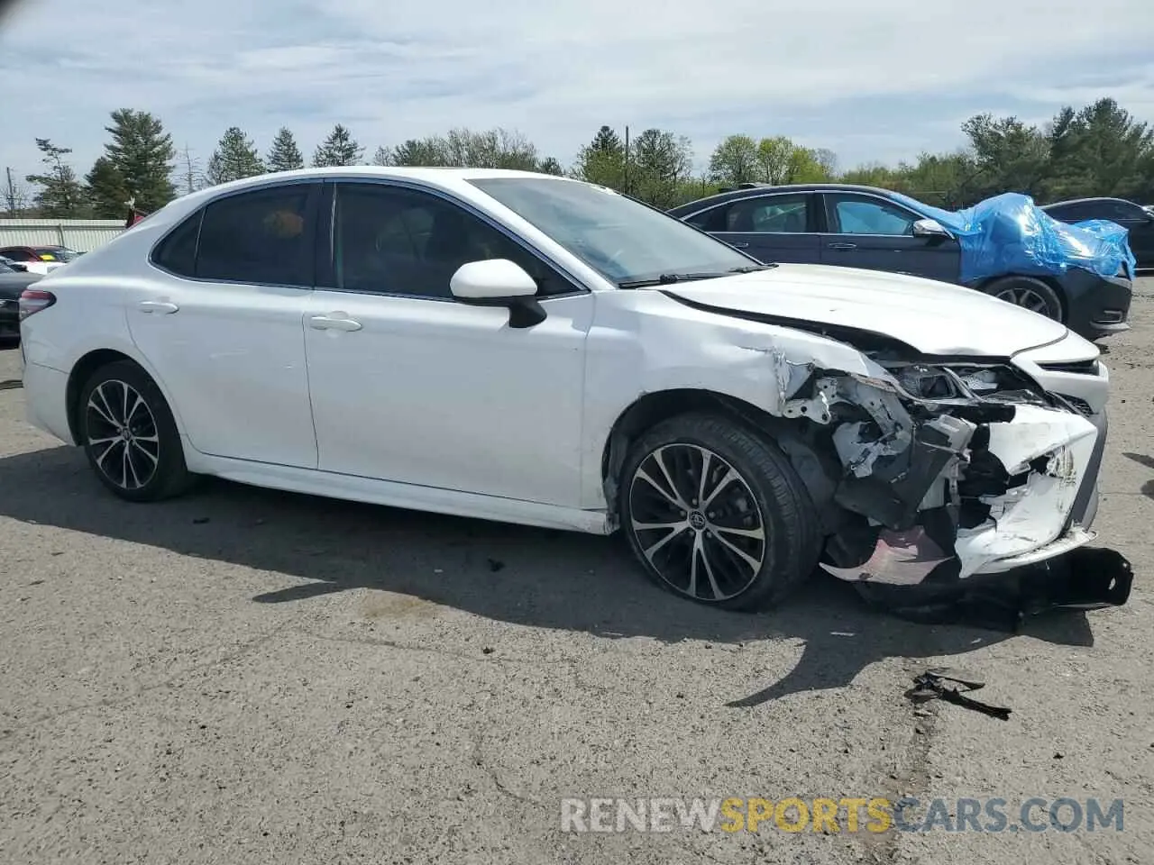 4 Photograph of a damaged car 4T1B11HK1KU277863 TOYOTA CAMRY 2019
