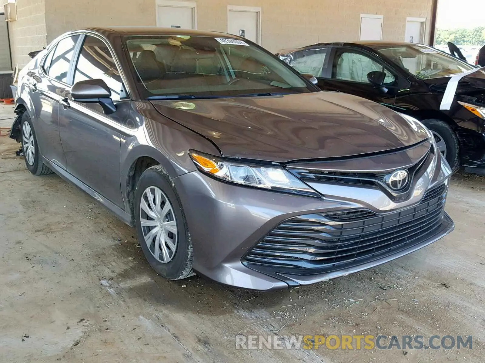 1 Photograph of a damaged car 4T1B11HK1KU682685 TOYOTA CAMRY 2019