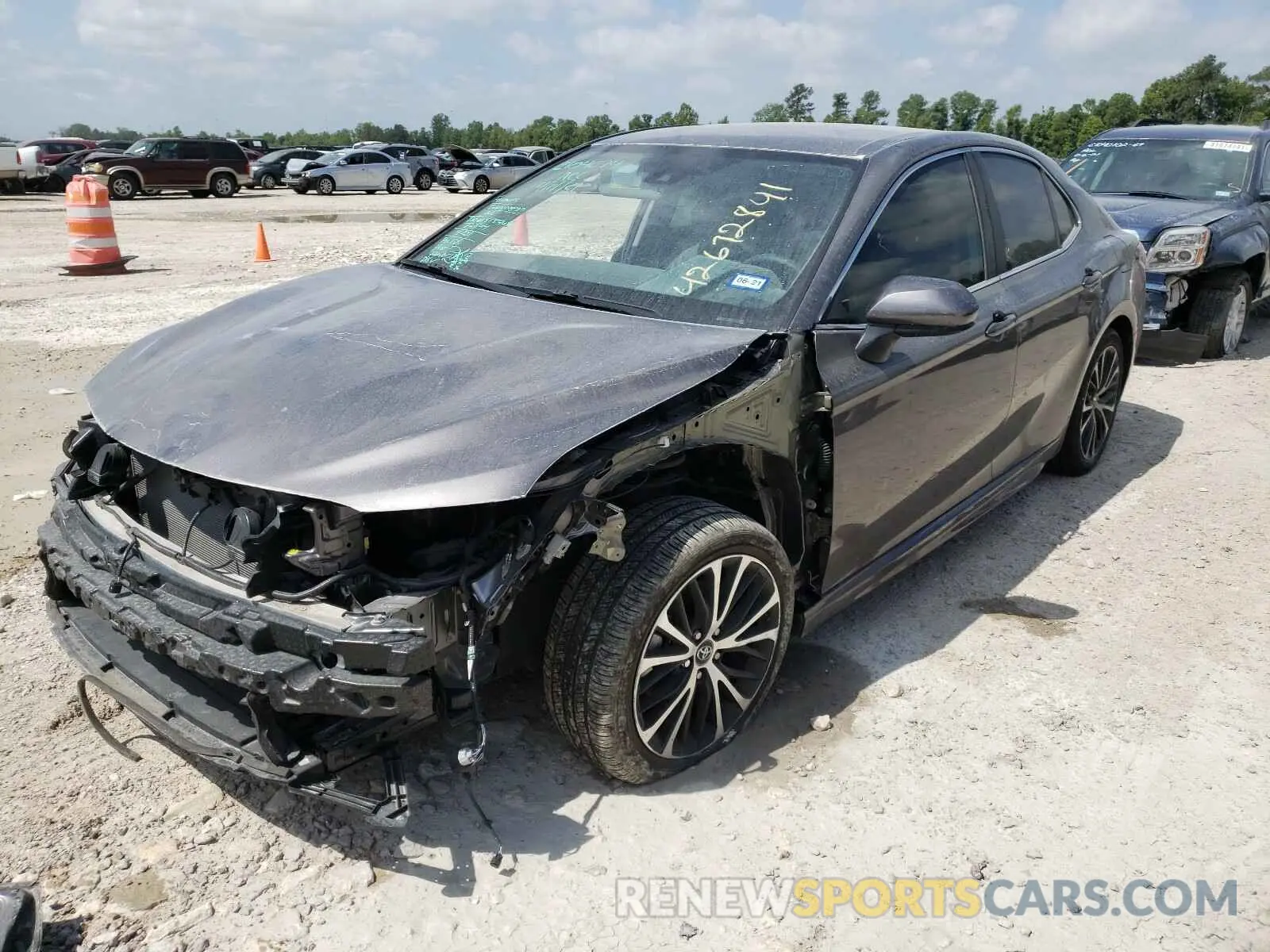 2 Photograph of a damaged car 4T1B11HK1KU683545 TOYOTA CAMRY 2019