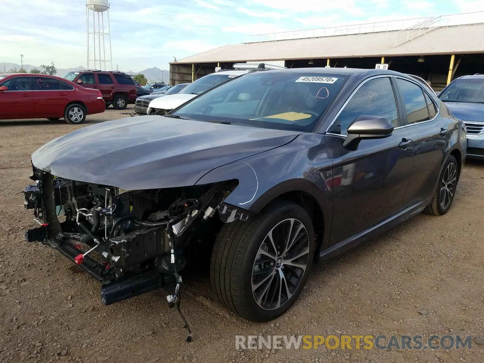 2 Photograph of a damaged car 4T1B11HK1KU693735 TOYOTA CAMRY 2019