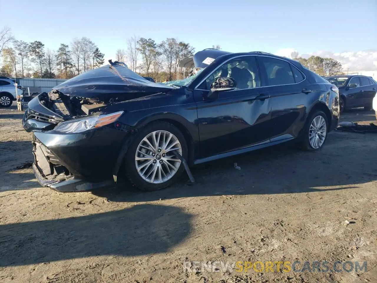 1 Photograph of a damaged car 4T1B11HK1KU694612 TOYOTA CAMRY 2019