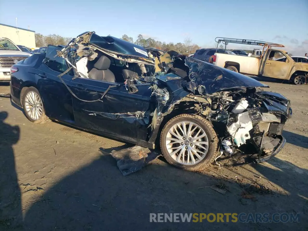 4 Photograph of a damaged car 4T1B11HK1KU694612 TOYOTA CAMRY 2019